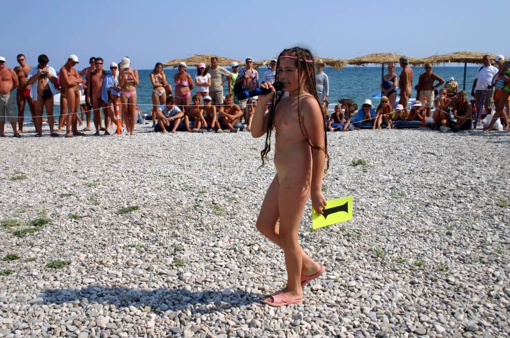 Naturist Mic Speech photos - Poor naked people and rich naked people in one place