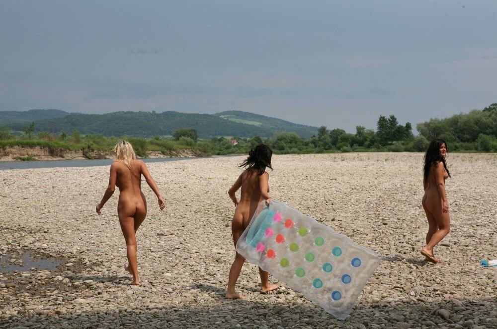 Naturist Park Floating On River photos - Nudism helps overcome shyness and insecurities