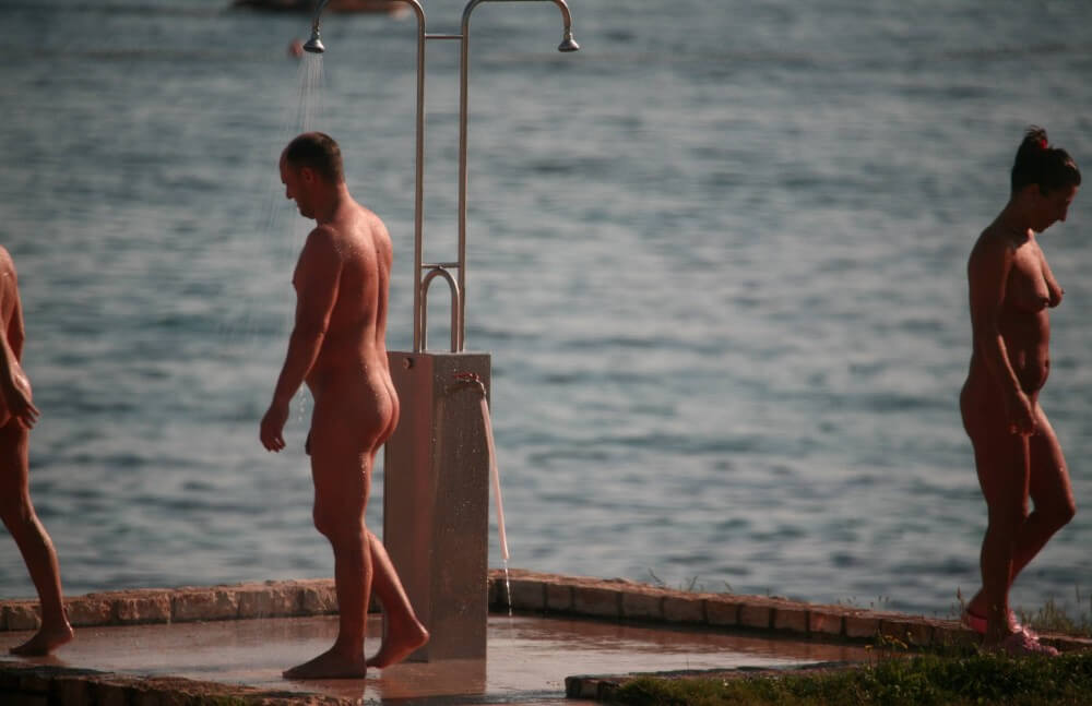 Naturist Shower at Dusk pics - Nudity is an expression of natural beauty