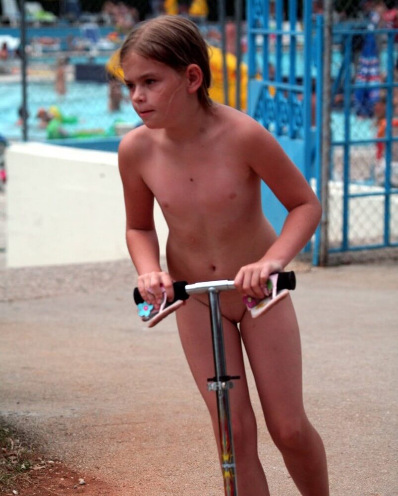 Pool-Side Naturist Scooter pics - Engaging in naturism promotes inner harmony and peace of mind